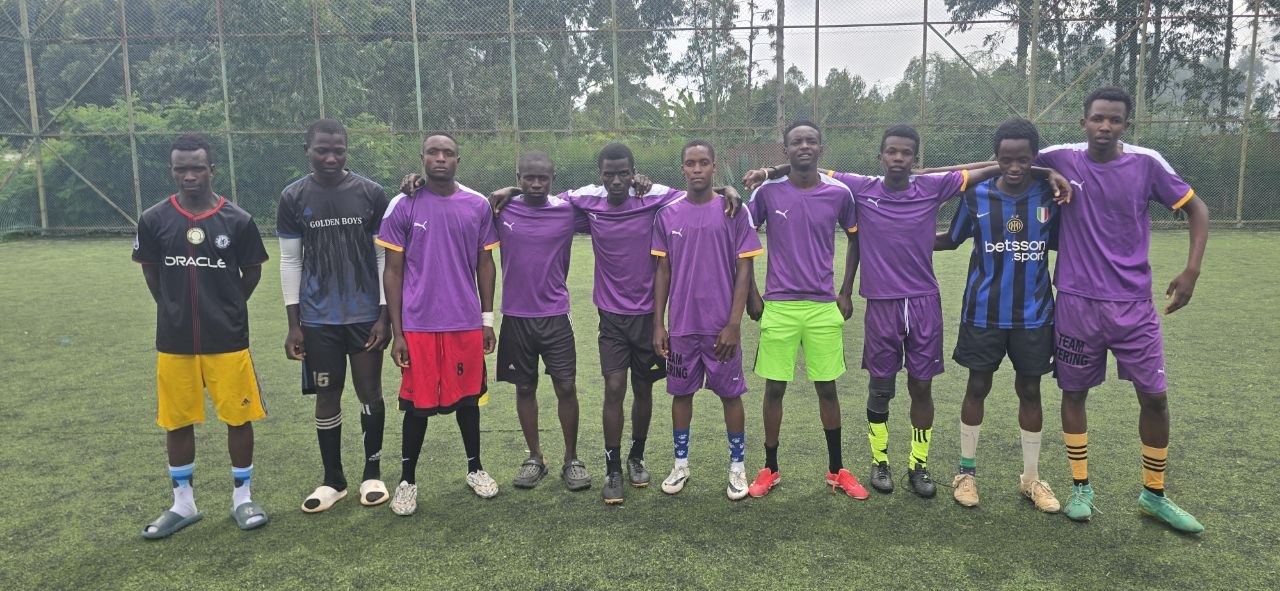 Tournament team posing in purple jerseys